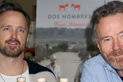 Breaking Bad stars Aaron Paul and Bryan Cranston sign bottles of Dos Hombres mezcal in Las Vegas